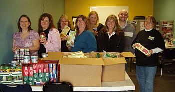 HD Supply volunteers with donations